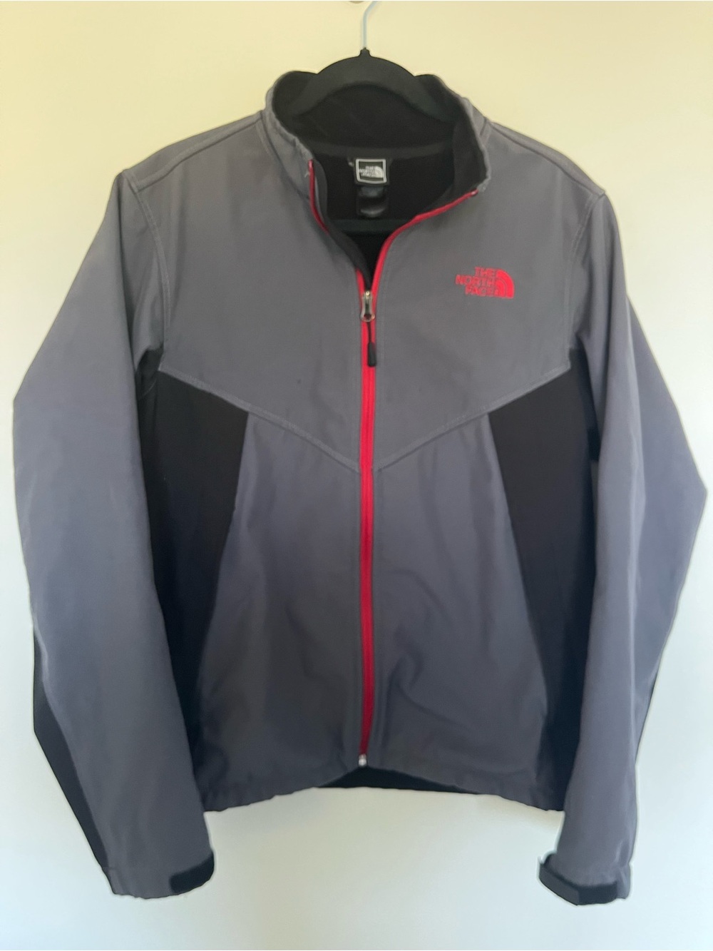 The North Face Men’s Grey and Black Jacket with Red Trim